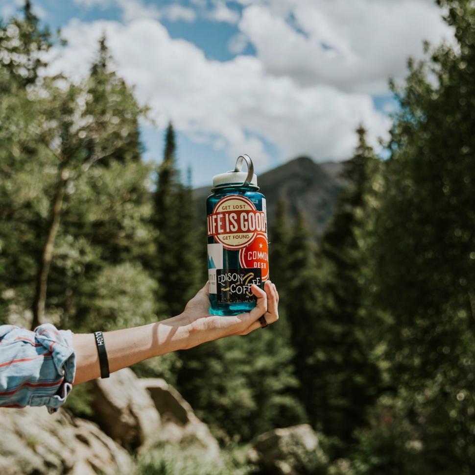 Free Image of Person Holding Can of Beer 