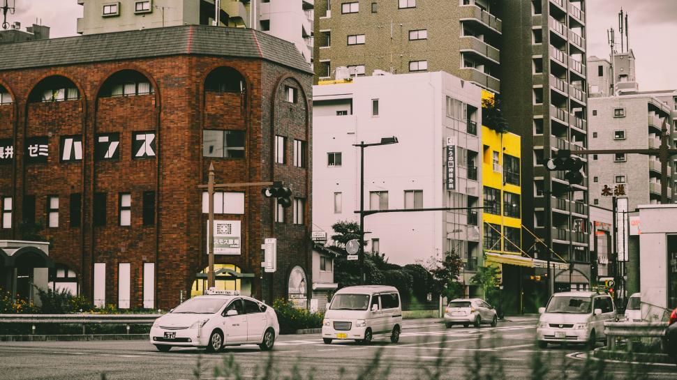 Free Image of Urban Street With Tall Buildings 