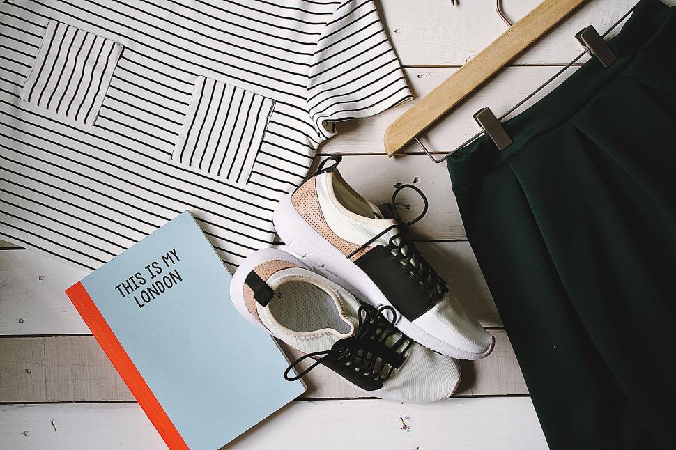 Free Image of Shoes and Book on Wooden Floor 