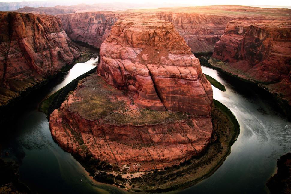 Free Image of River Flowing Through Canyon Surrounded by Mountains 