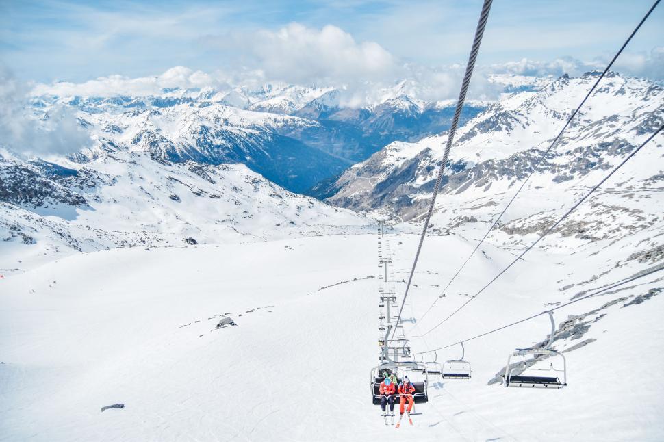 Free Image of Ski Lift Ascending Snowy Mountain 