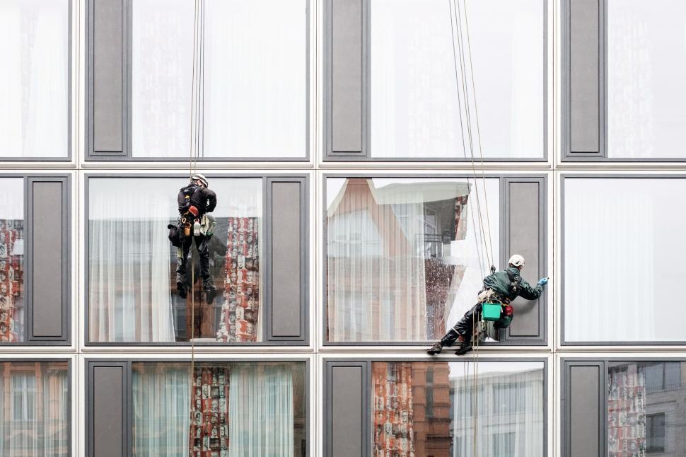 Free Image of Person Snowboarding in Front of Window 