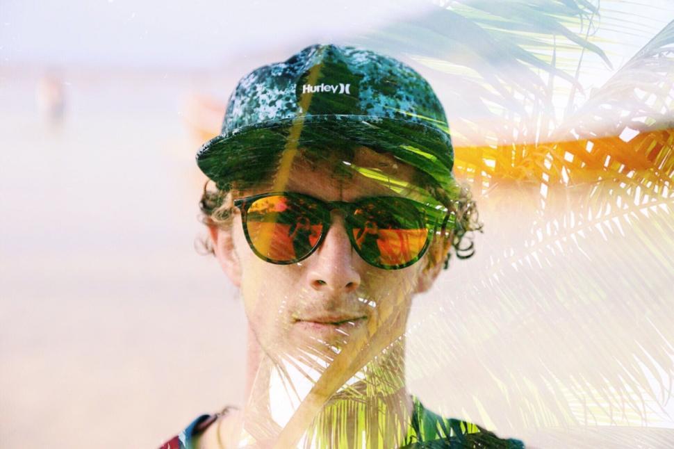 Free Image of Man Wearing Green Hat and Sunglasses 