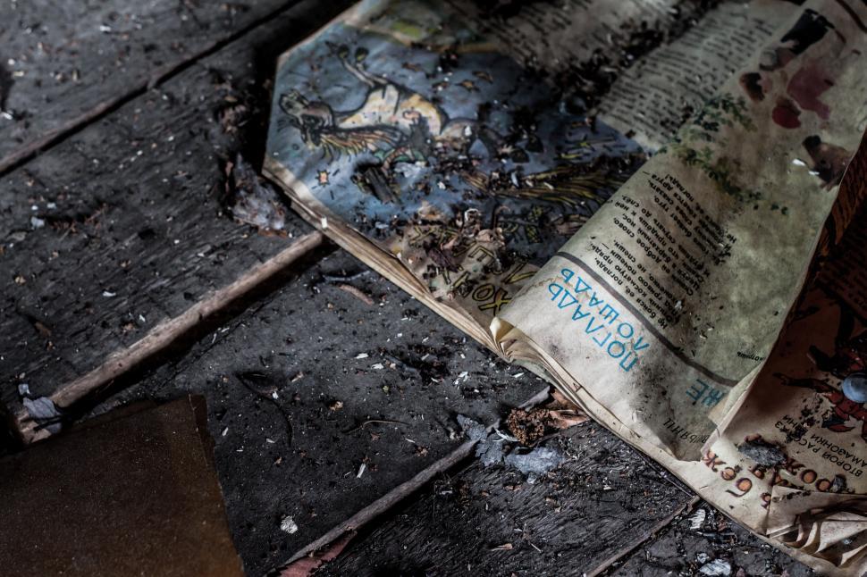 Free Image of Newspaper on Wooden Floor 