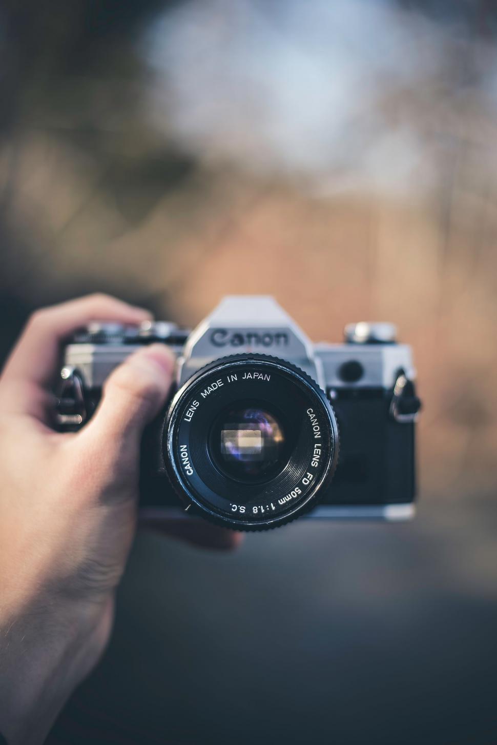 Free Image of Person Holding Camera 