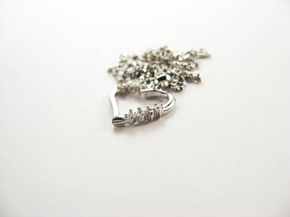 Free Image of silver pendant with chain 