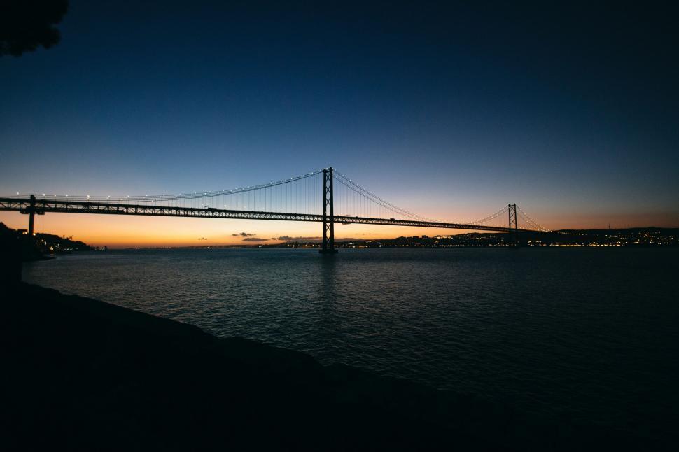 Free Image of Majestic Bridge Spanning Vast Body of Water 