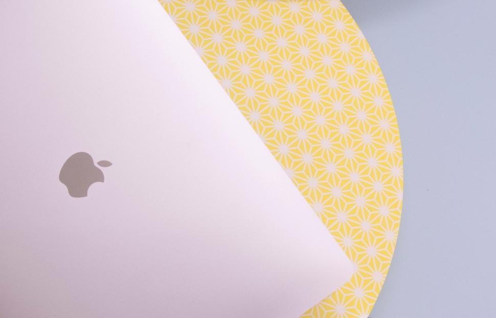Free Image of Close Up of an Apple Laptop on a Table 