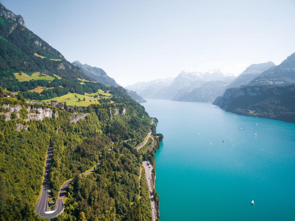 Free Image of Aerial View of Lake Surrounded by Mountains 