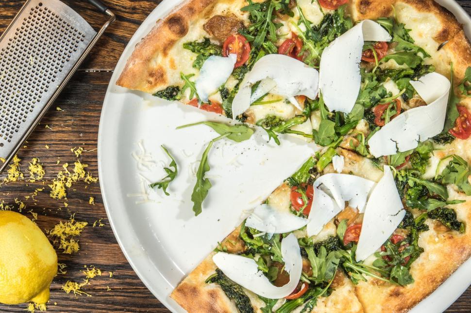 Free Image of White Plate With Topped Pizza 