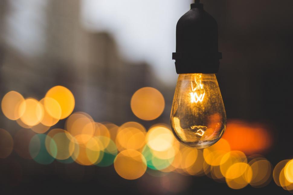 Free Image of Light Bulb Hanging From Ceiling in Room 