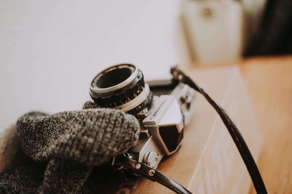 Free Image of Camera and Gloves on Table 