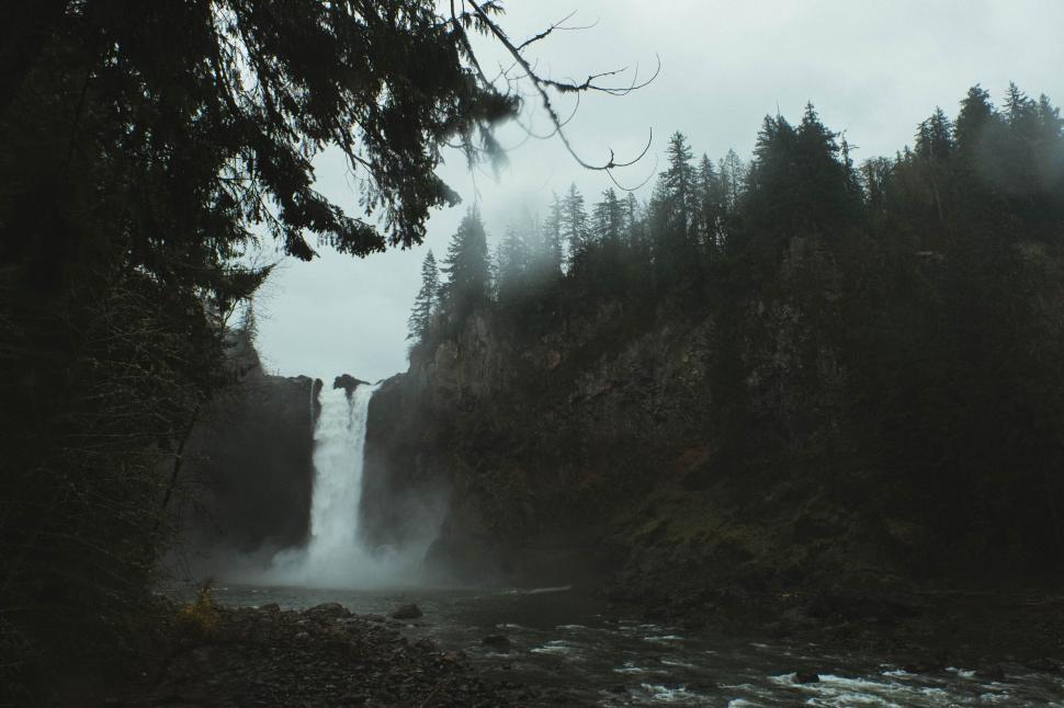 Free Image of Majestic Waterfall Cascading in Black and White 