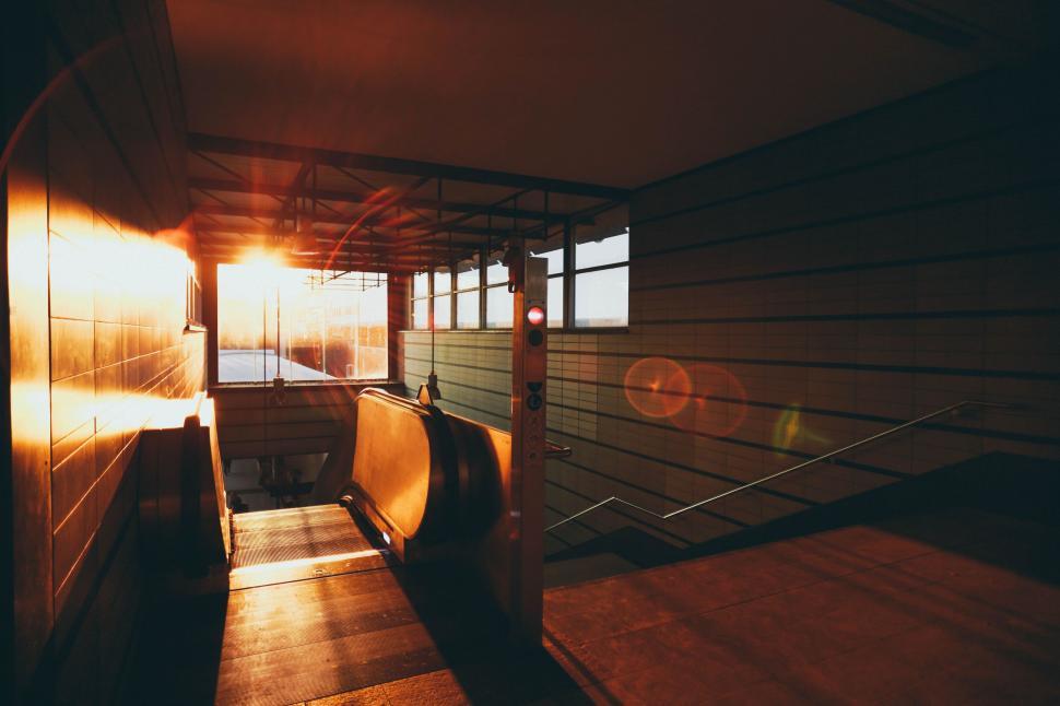 Free Image of Sun Shining Through Windows of Building 