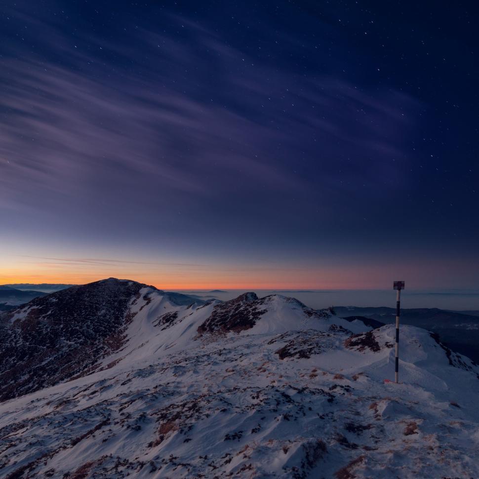 Free Image of Snowy Mountain Under Starry Sky 