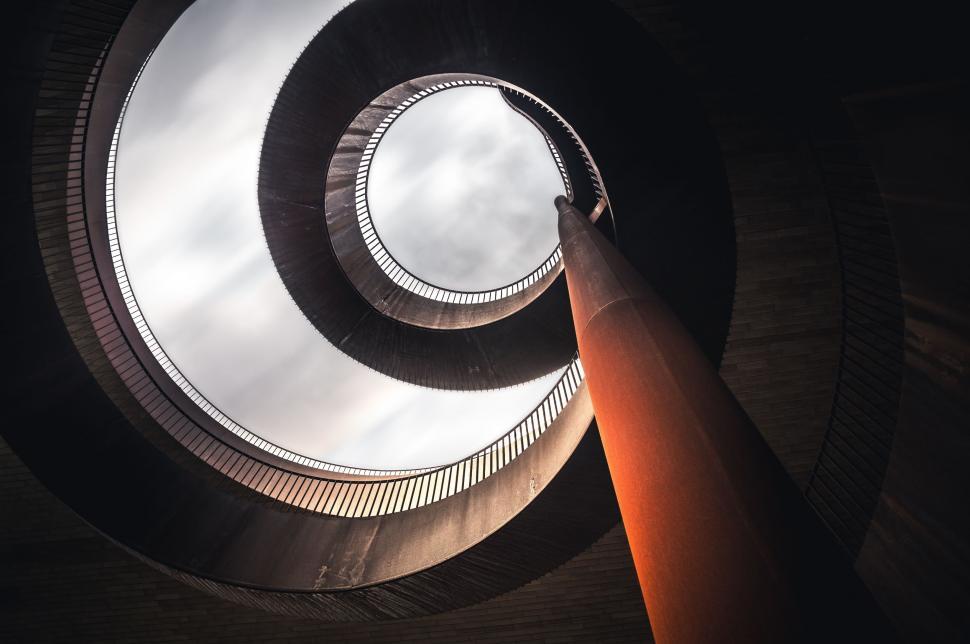 Free Image of Hand Pointing at Circular Window 