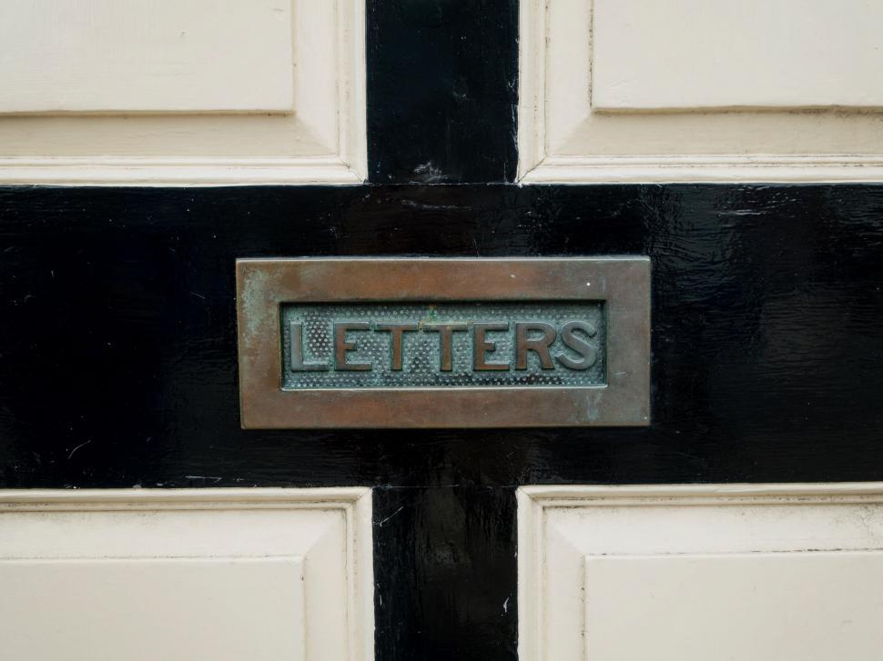 Free Image of Close Up of a Door With a Sign 