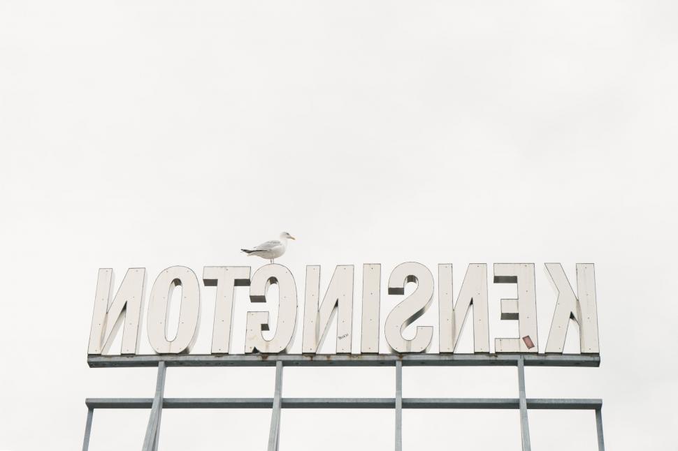 Free Image of Kensington Sign Atop Urban Building 