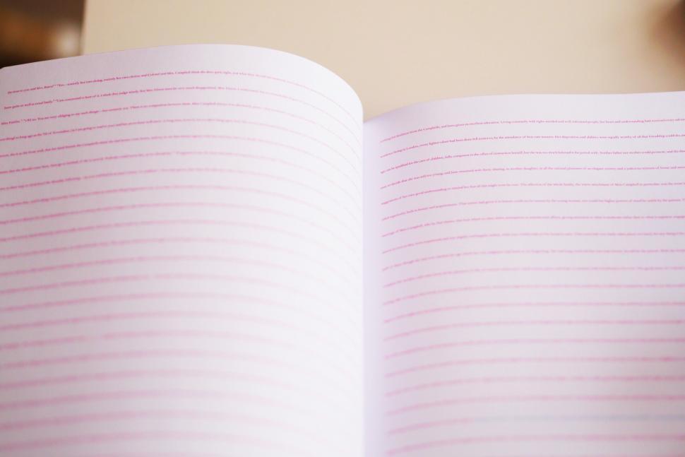 Free Image of Open Book on a Table 