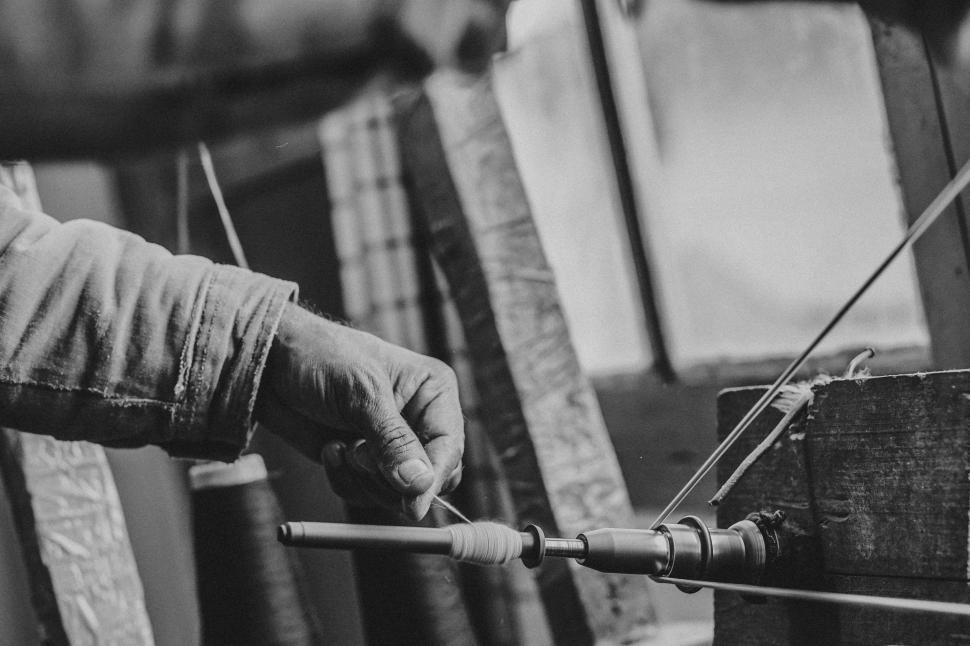 Free Image of Person Holding Wooden Object 
