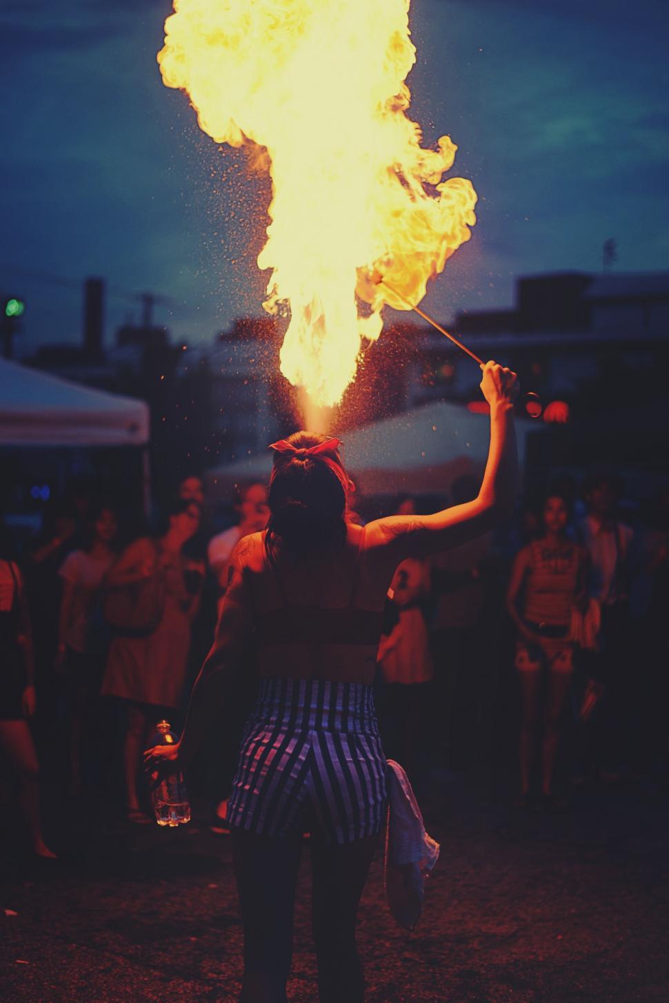 Free Image of Woman Holding Fire Stick 
