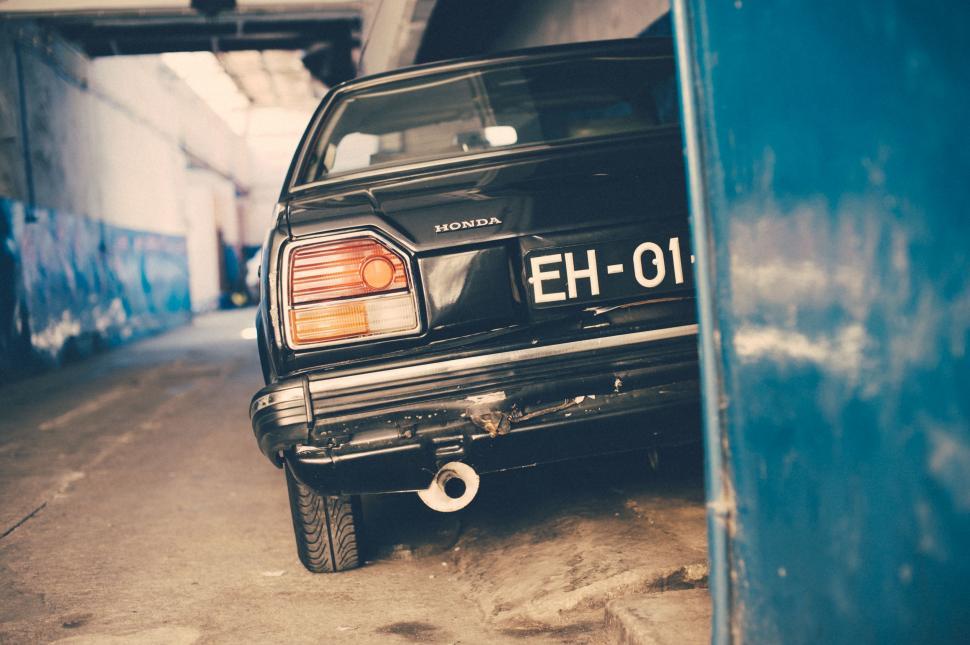 Free Image of Black Truck Parked in a Parking Garage 