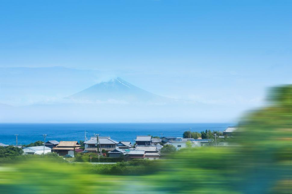 Free Image of Blurry Photo of a Small Town by the Ocean 