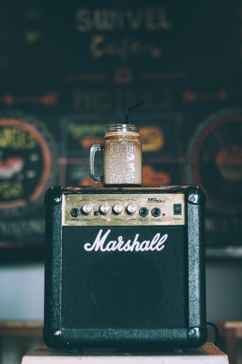 Free Image of Beer Mug on Top of an Amp 