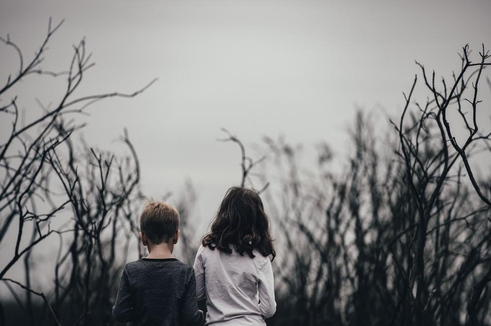 Free Image of Two Kids Standing Together 