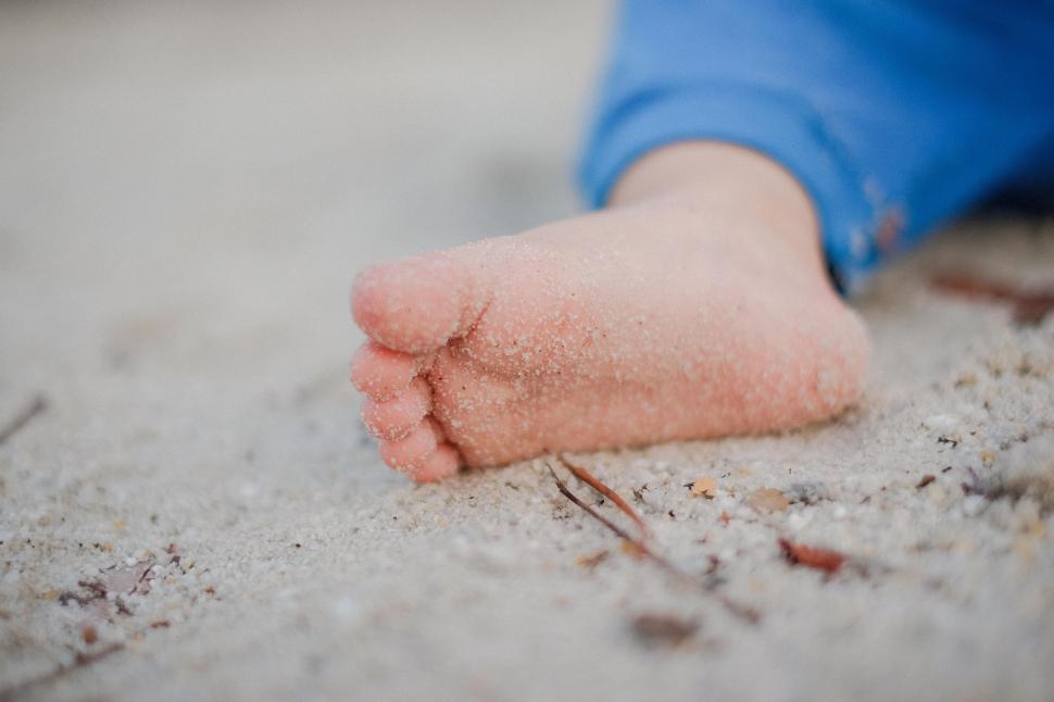 Free Image of Persons Foot in Sand 