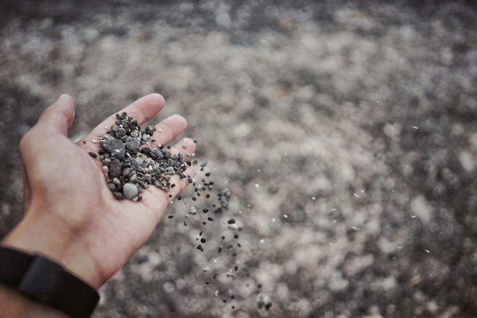 Free Image of Person Holding Handful of Dirt 