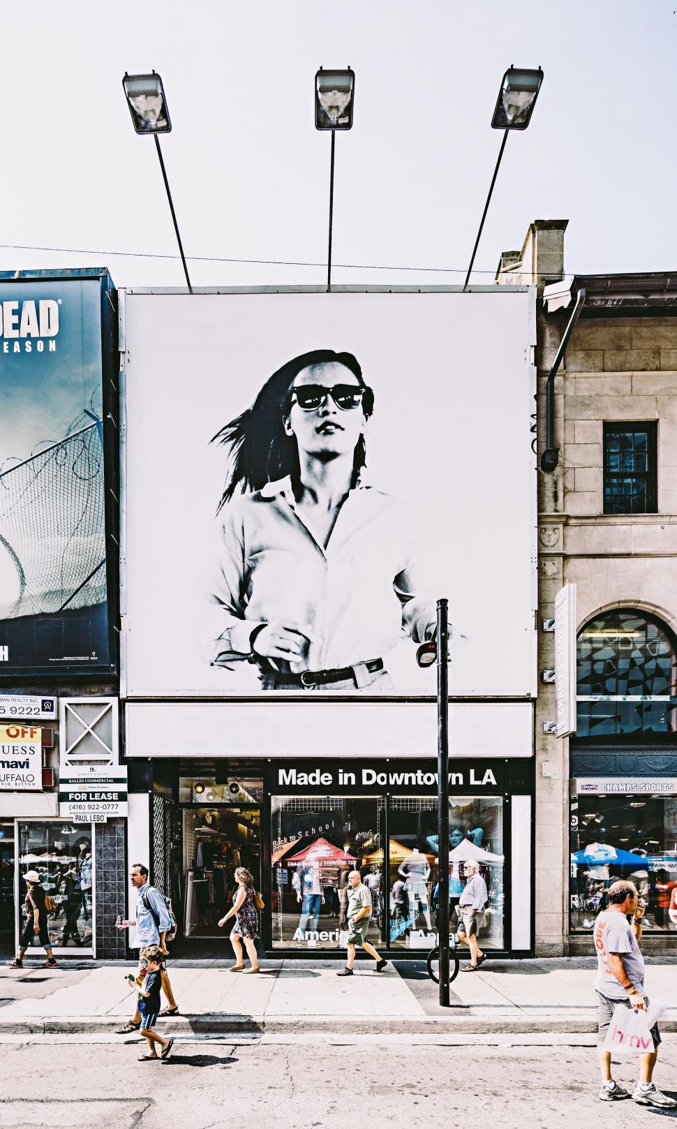 Free Image of Giant Tennis Player Poster on Building 