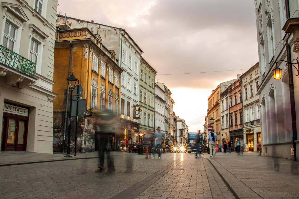 Free Image of Person Walking Down Street With Umbrella 