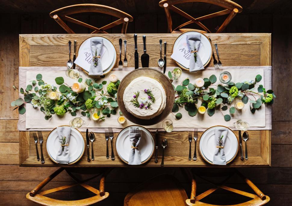 Free Image of Wooden Table With Plates and Silverware 
