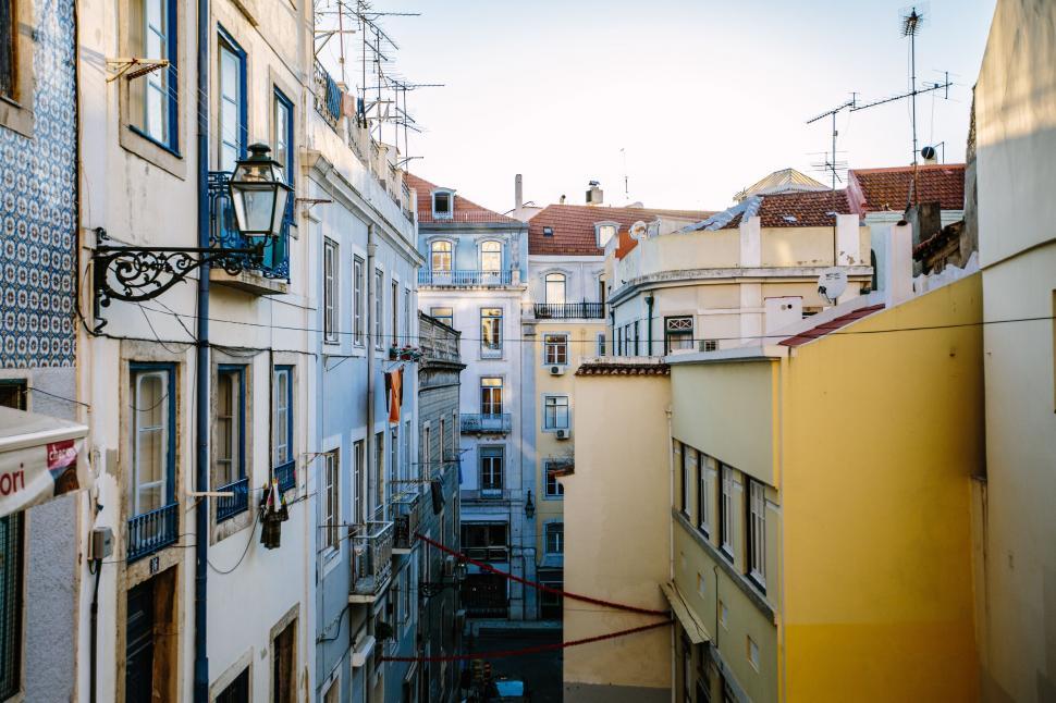 Free Image of Urban Alleyway With Tall Buildings 