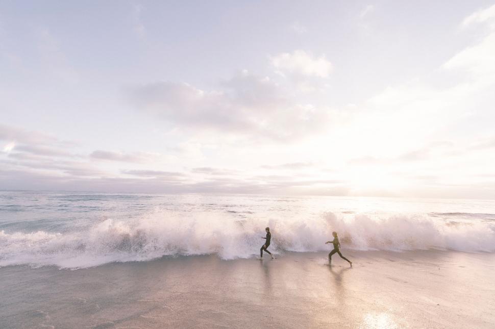 Free Image of Couple Standing in Water 
