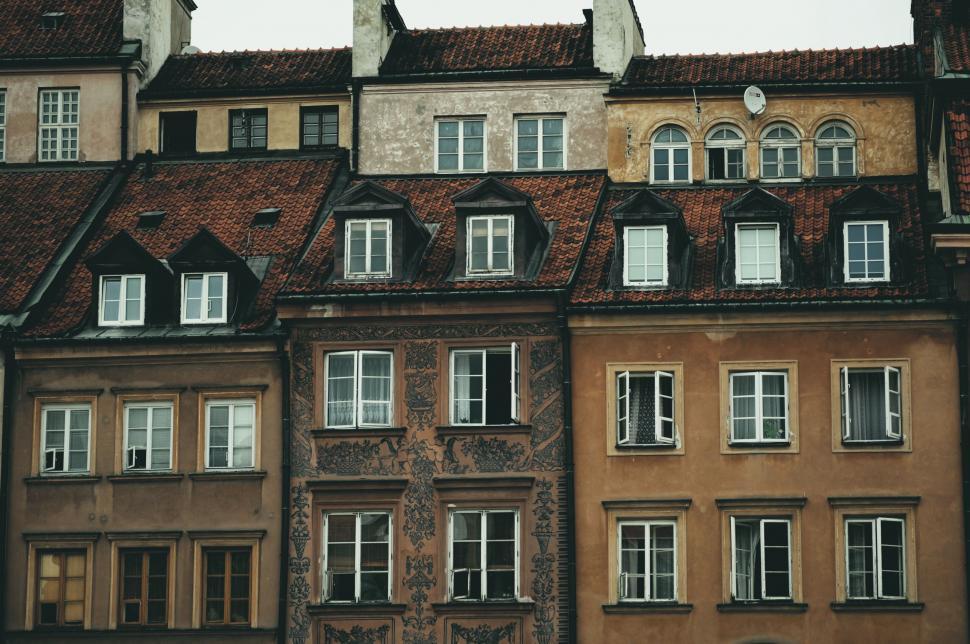 Free Image of Old Building With Many Windows and Clock 