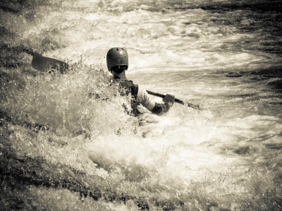 Free Image of Man kayaking in river 
