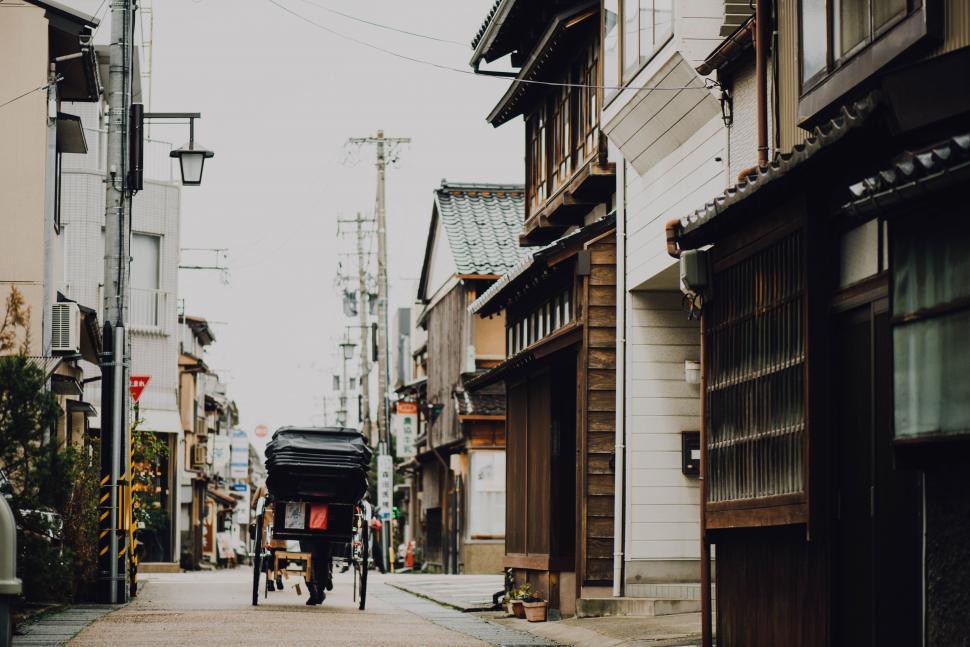Free Image of Horse Drawn Carriage on a Narrow City Street 