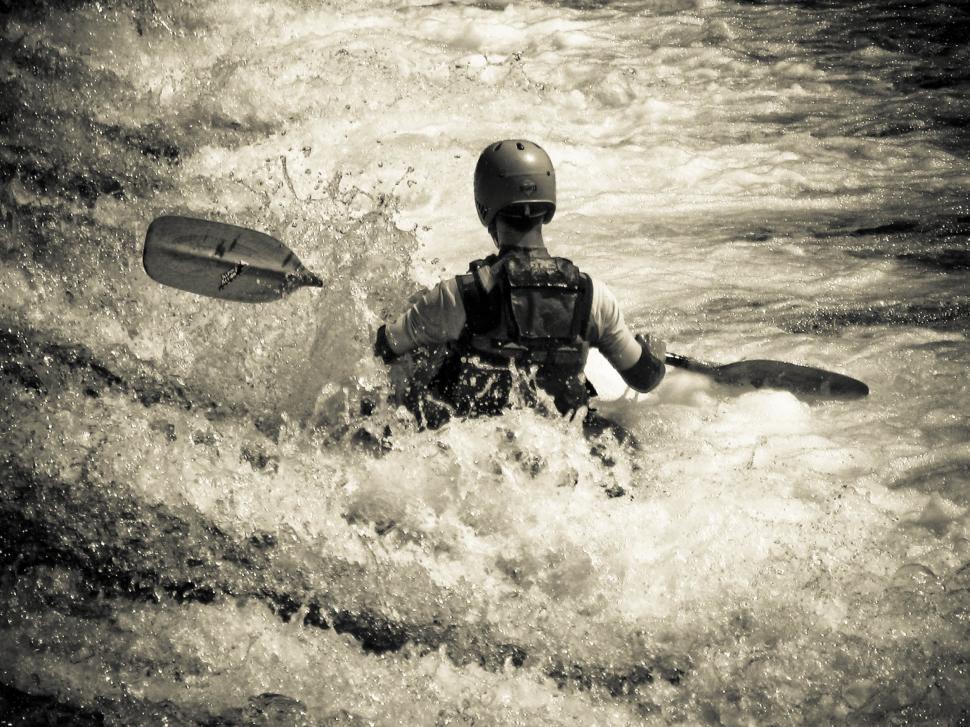 Free Image of Man in rapids 