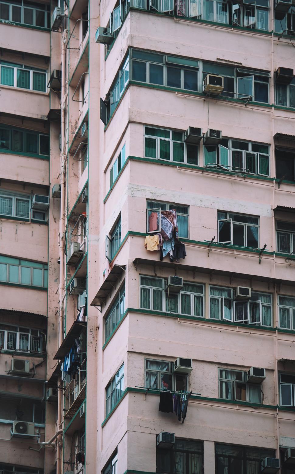 Free Image of Tall Building With Numerous Windows 