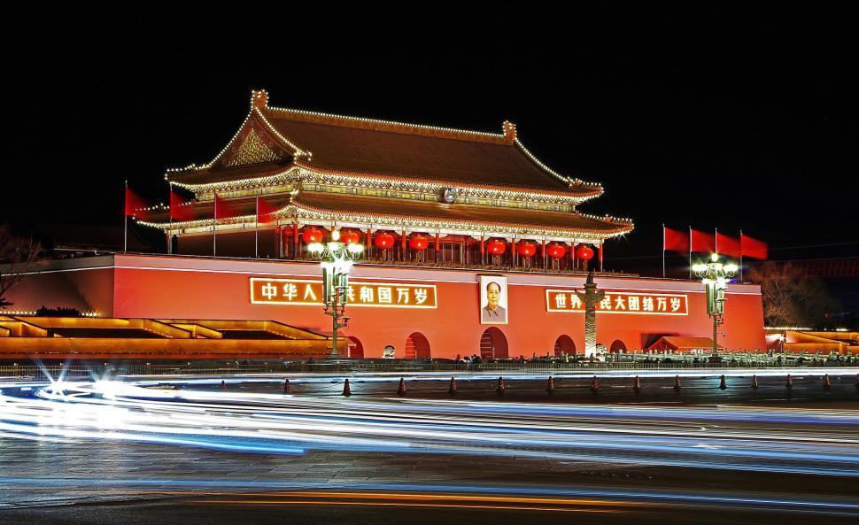 Free Image of Grand Building With Numerous Flags Atop 