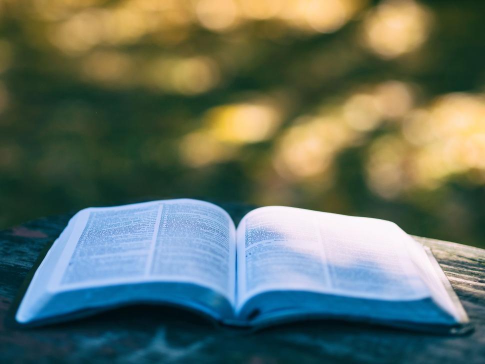 Free Image of Open Book on Wooden Table 