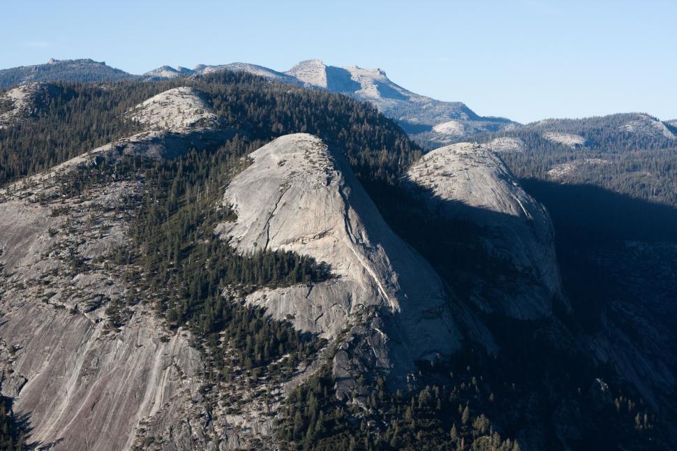 Free Image of A View of the Top of a Mountain With Trees 